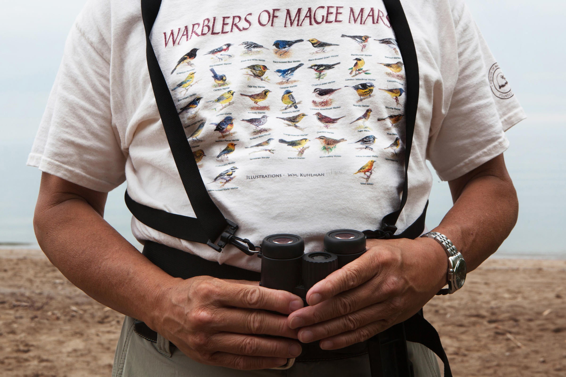 A recurrent festivalgoer sports a vintage Biggest Week shirt. Camilla Cerea/Audubon