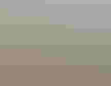 Aerial view of a river winding through a vast landscape.