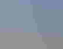 Behind-the-scenes photo of Tomas Koeck with his camera.