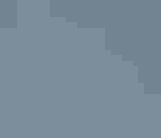 An avocet stands in shallow blue water with water dripping from its beak.