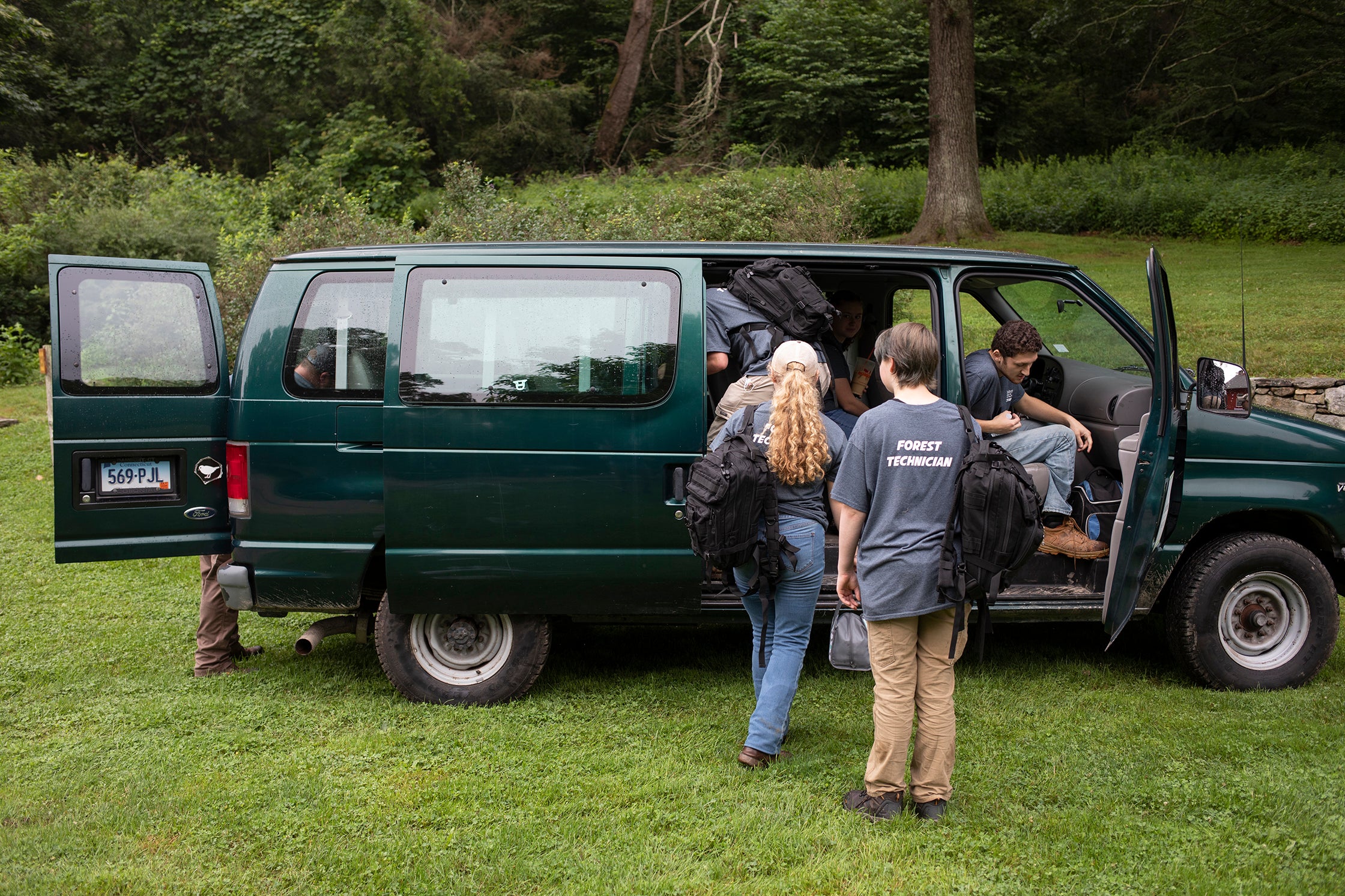 People getting into a van
