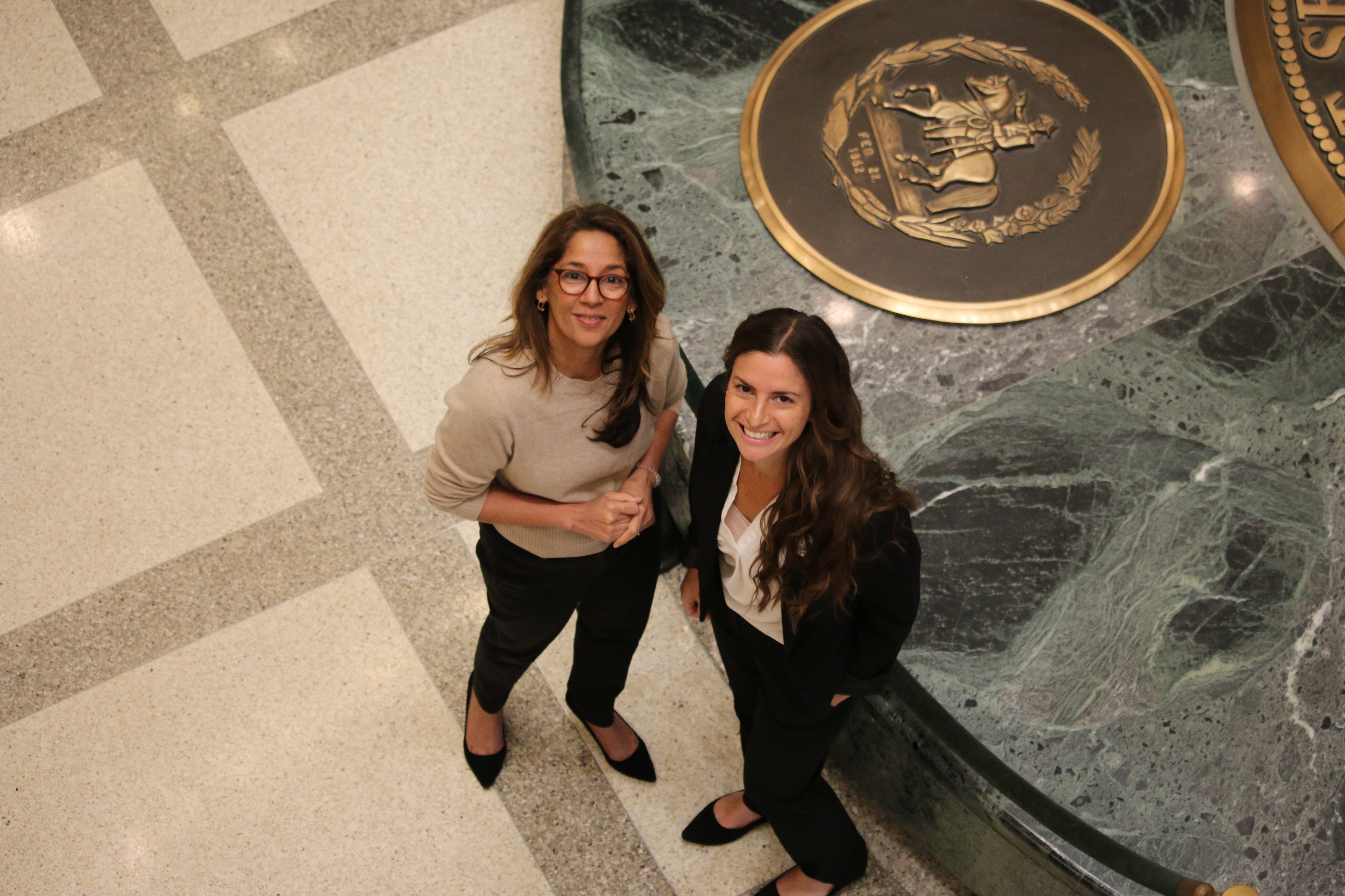 two people stare up at the camera