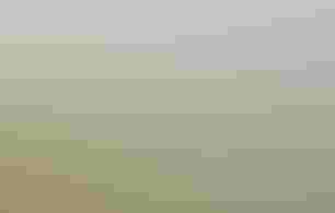 Landscape with a small red device floating down a river.