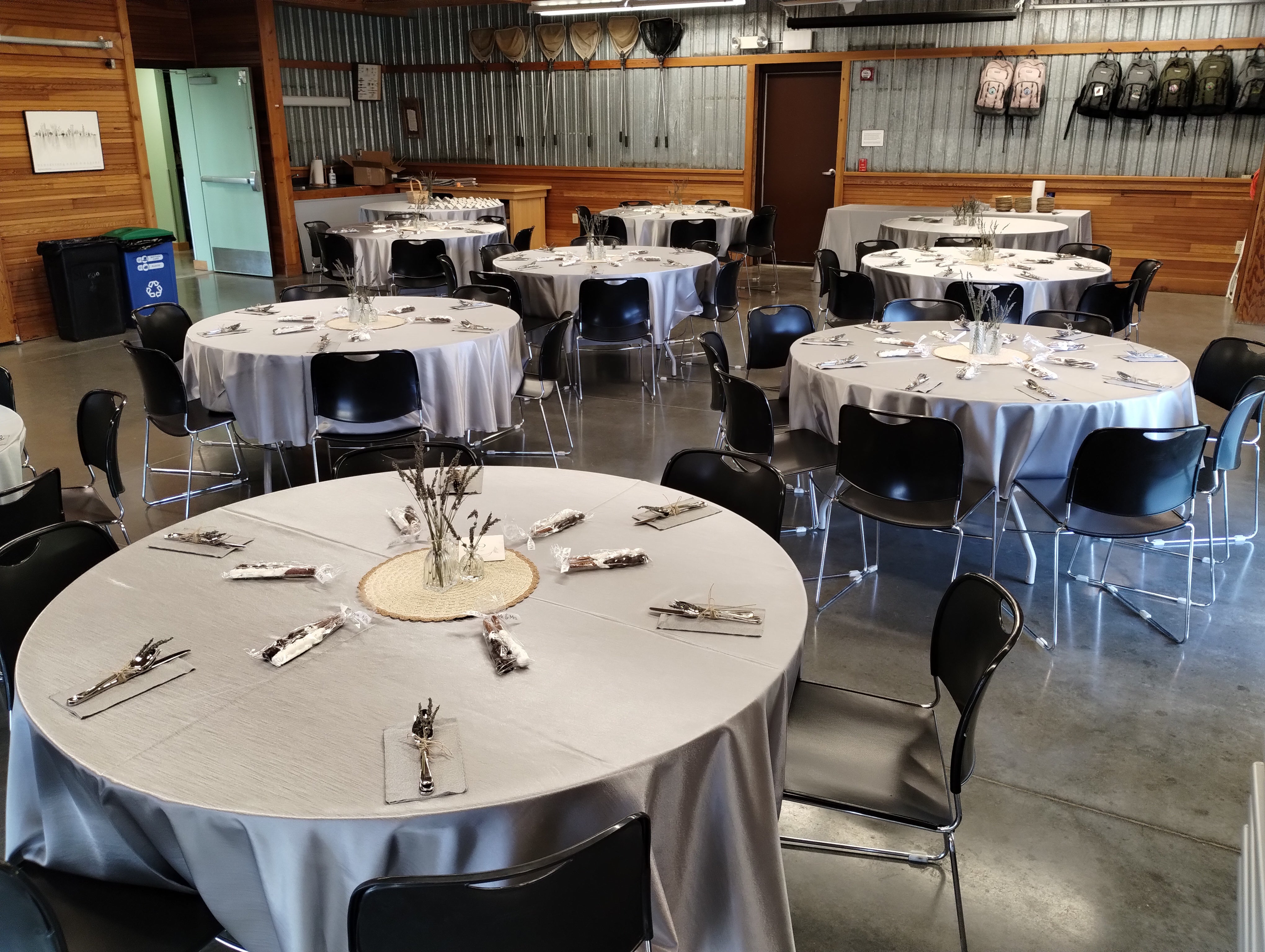 room with round tables and decorated for a formal event