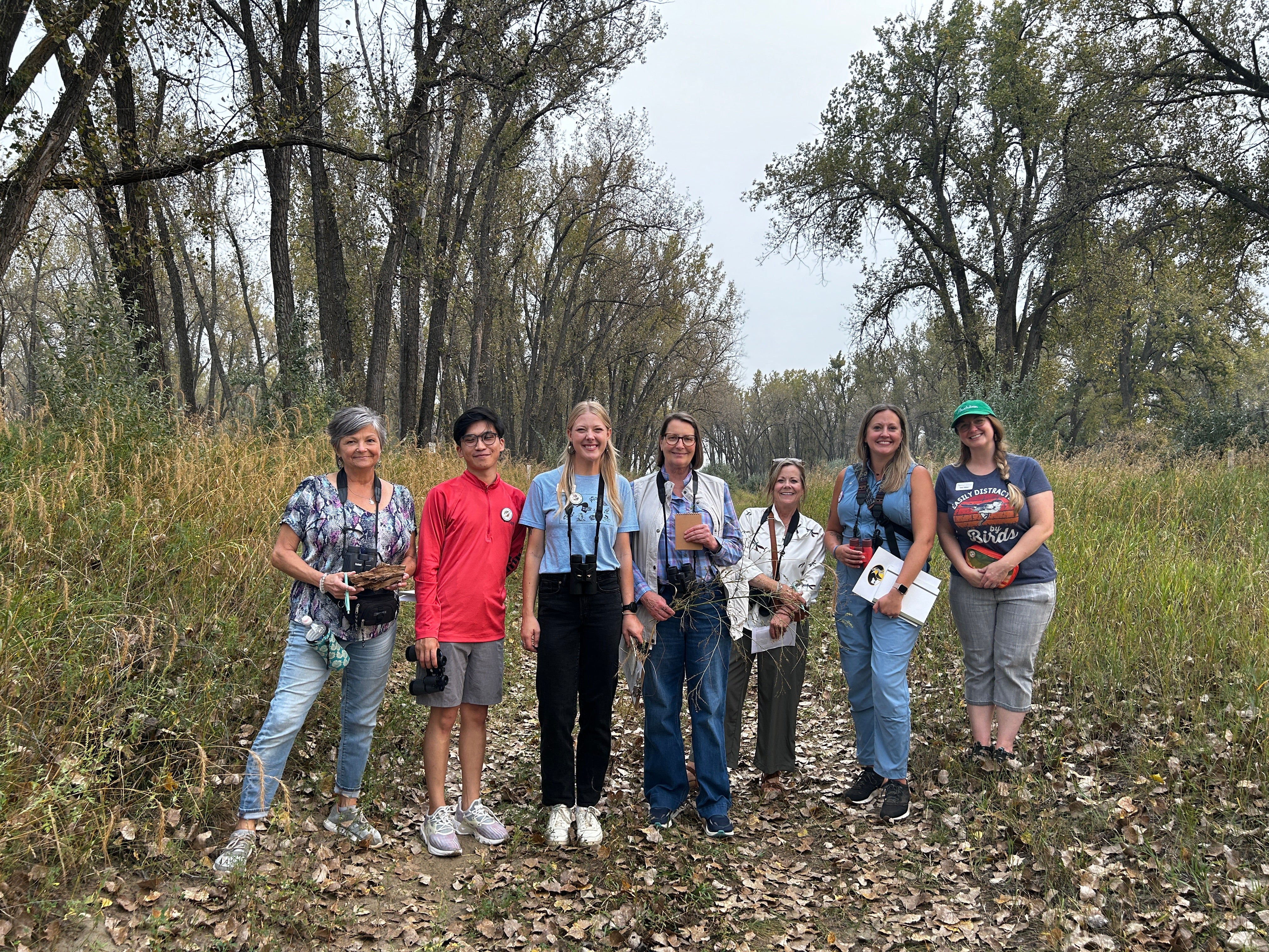 group of people with binoculars