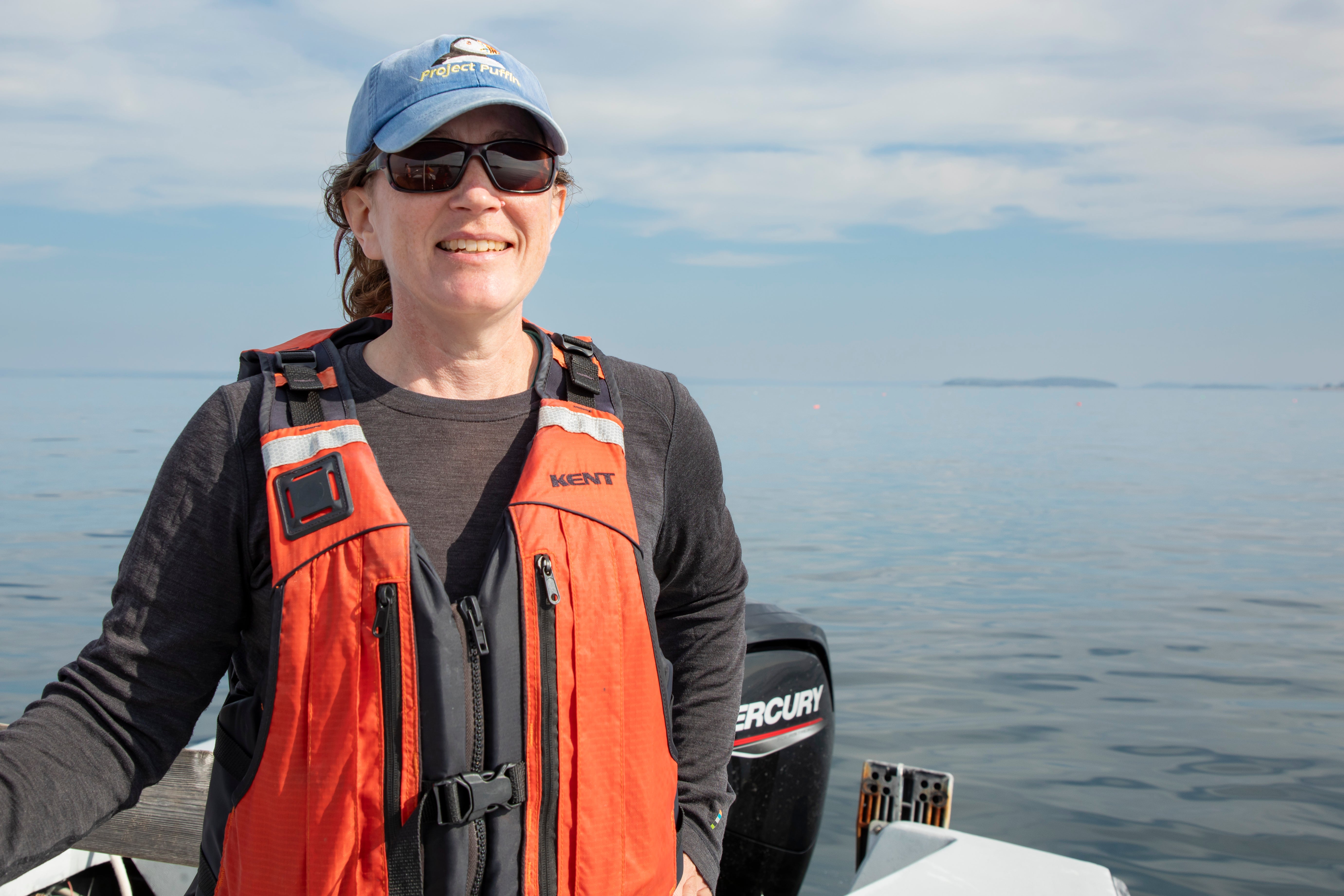 A person standing on a boat.