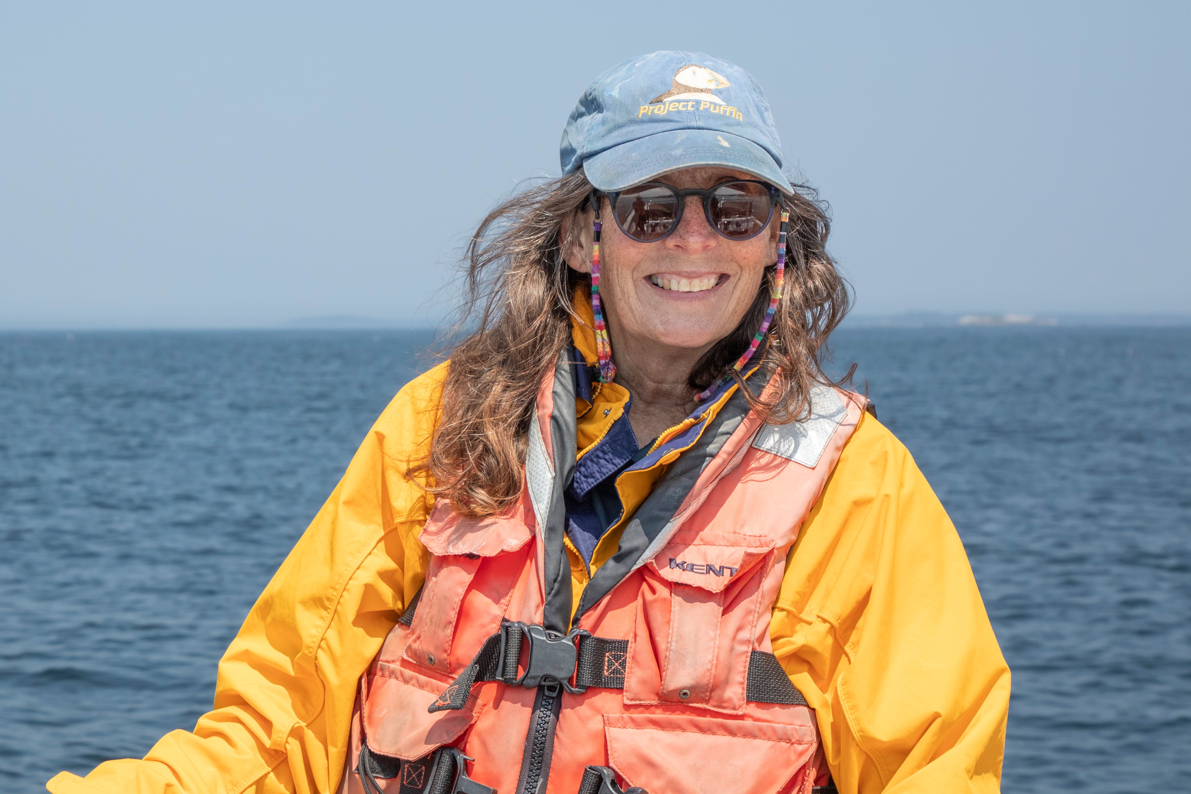 Sue Schubel wearing a project puffin hat.