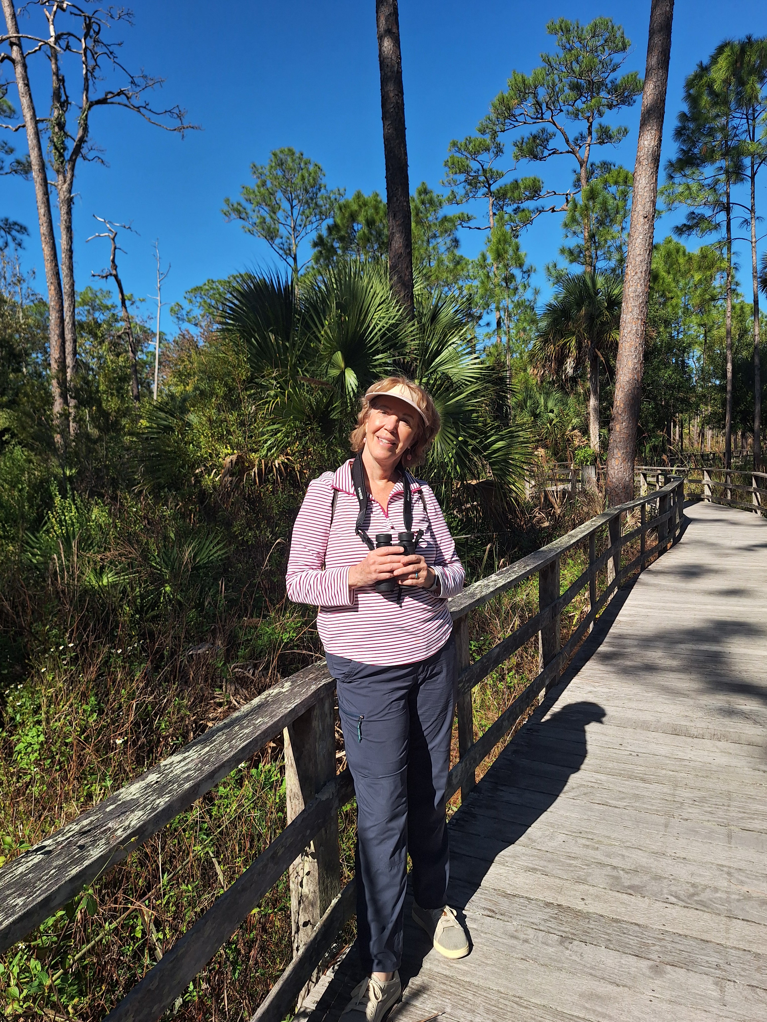 A person on a boardwalk
