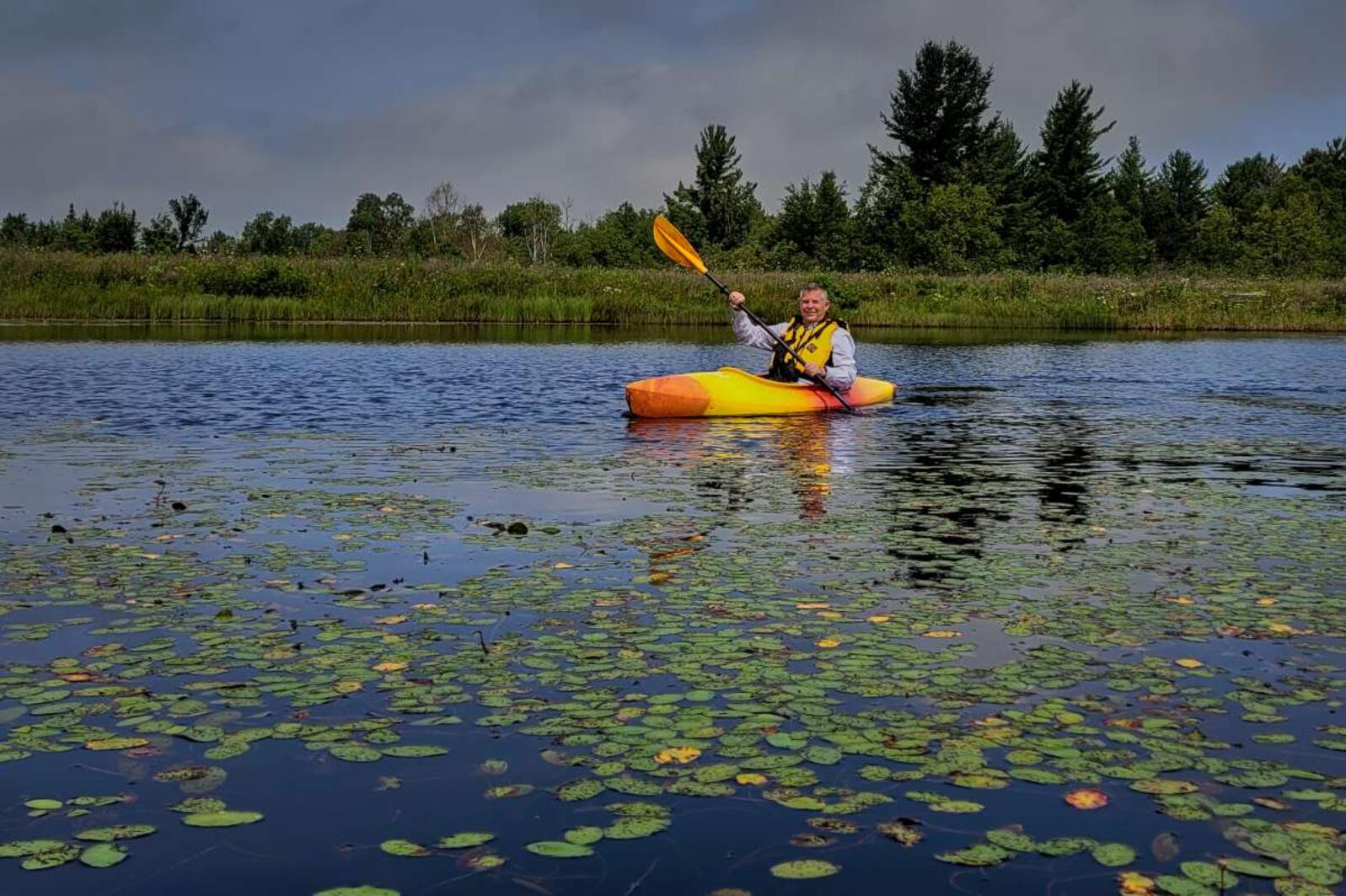 Volunteer Mark Harder in a kayak on the water scouting his survey area for Black Terns. 
