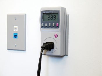 Kill A Watt device plugged into wall