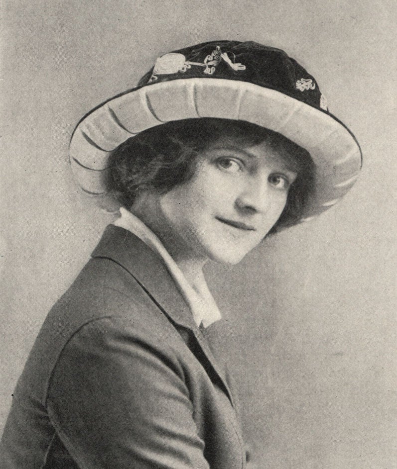 A 19th-century woman wearing an Audubonnet. The sample of the feather-free hat in the exhibit is a reproduction. Courtesy of the American Museum of Natural History