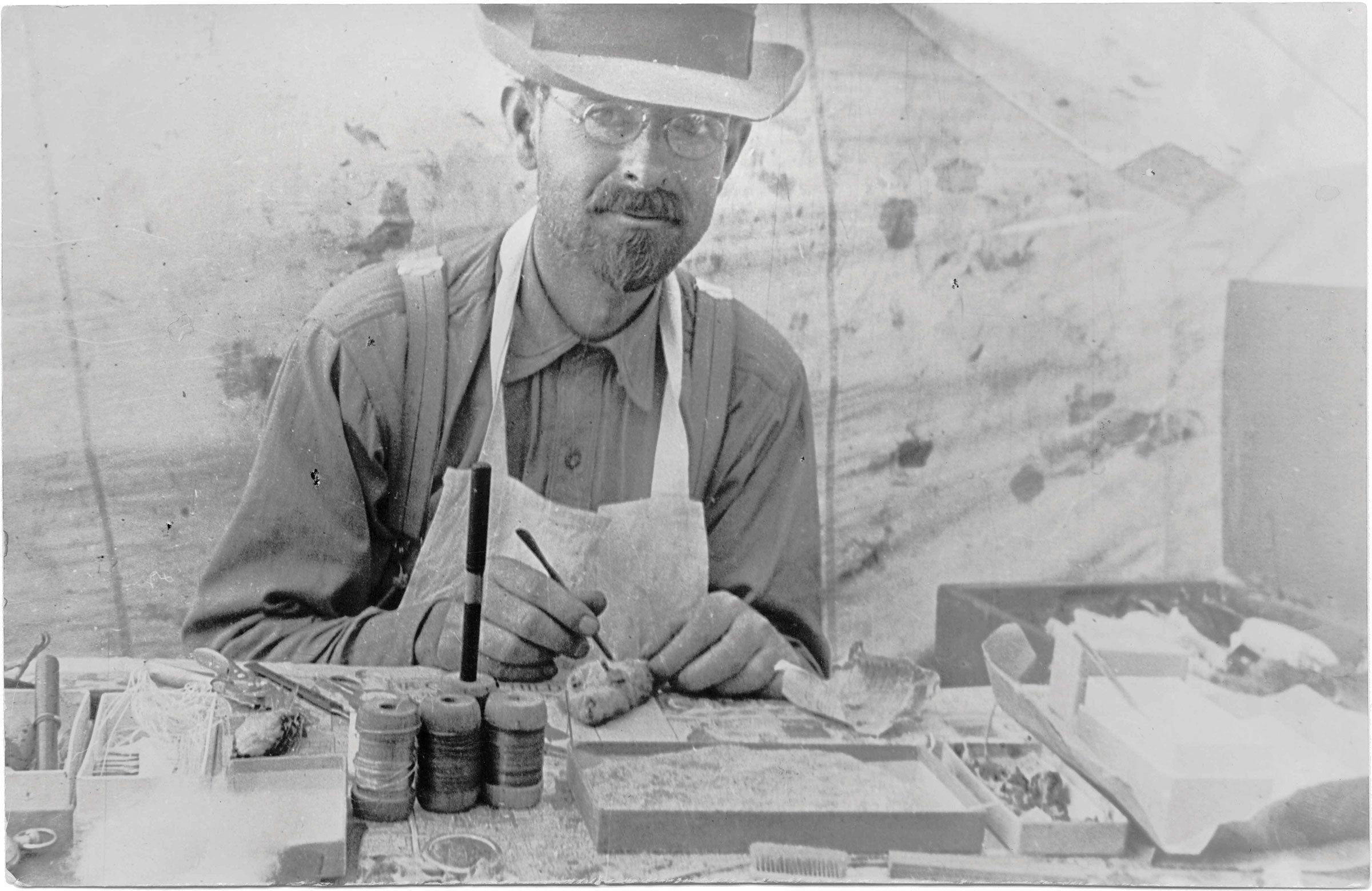 Joseph Grinnell, the first director of the University of California Museum of Vertebrate Zoology, prepares a field specimen. The Bancroft Library/University of California