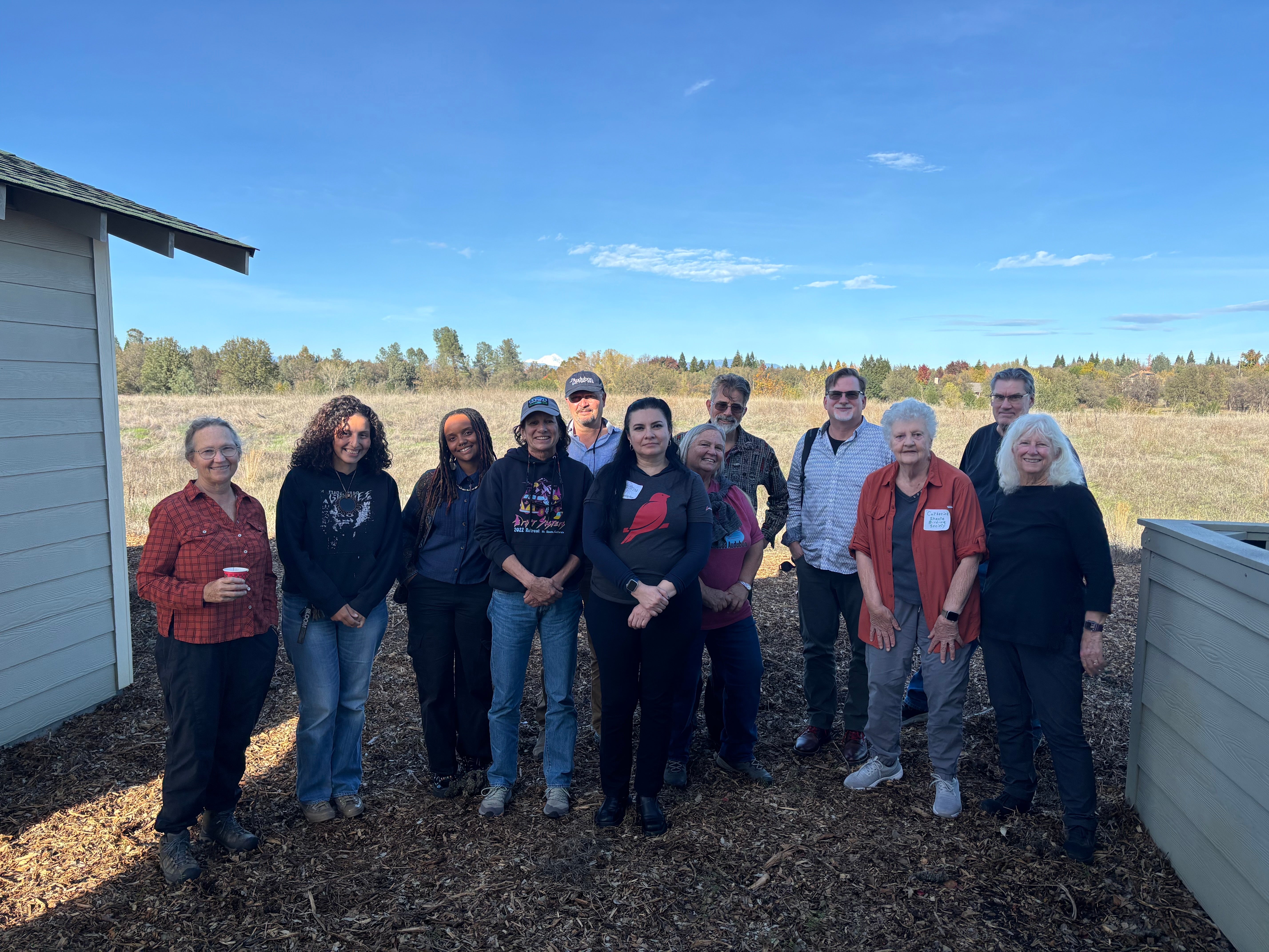 A group of 12 people from Northern California chapters and Audubon staff pose together 