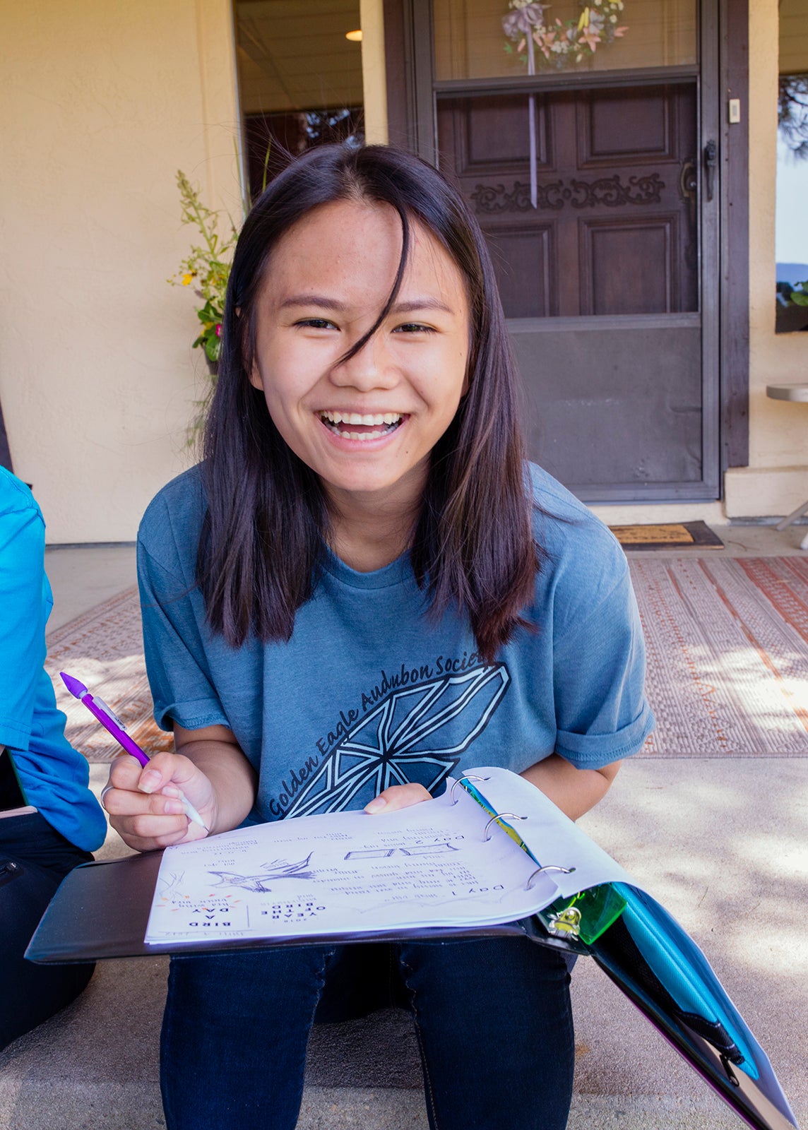 Cathalee La, a New Roots junior leader, jots down information about hummingbirds. Mike Fernandez/Audubon