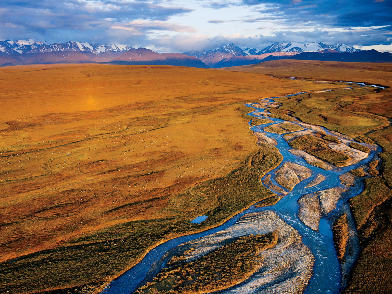 River valley surrounded by plains and mountains