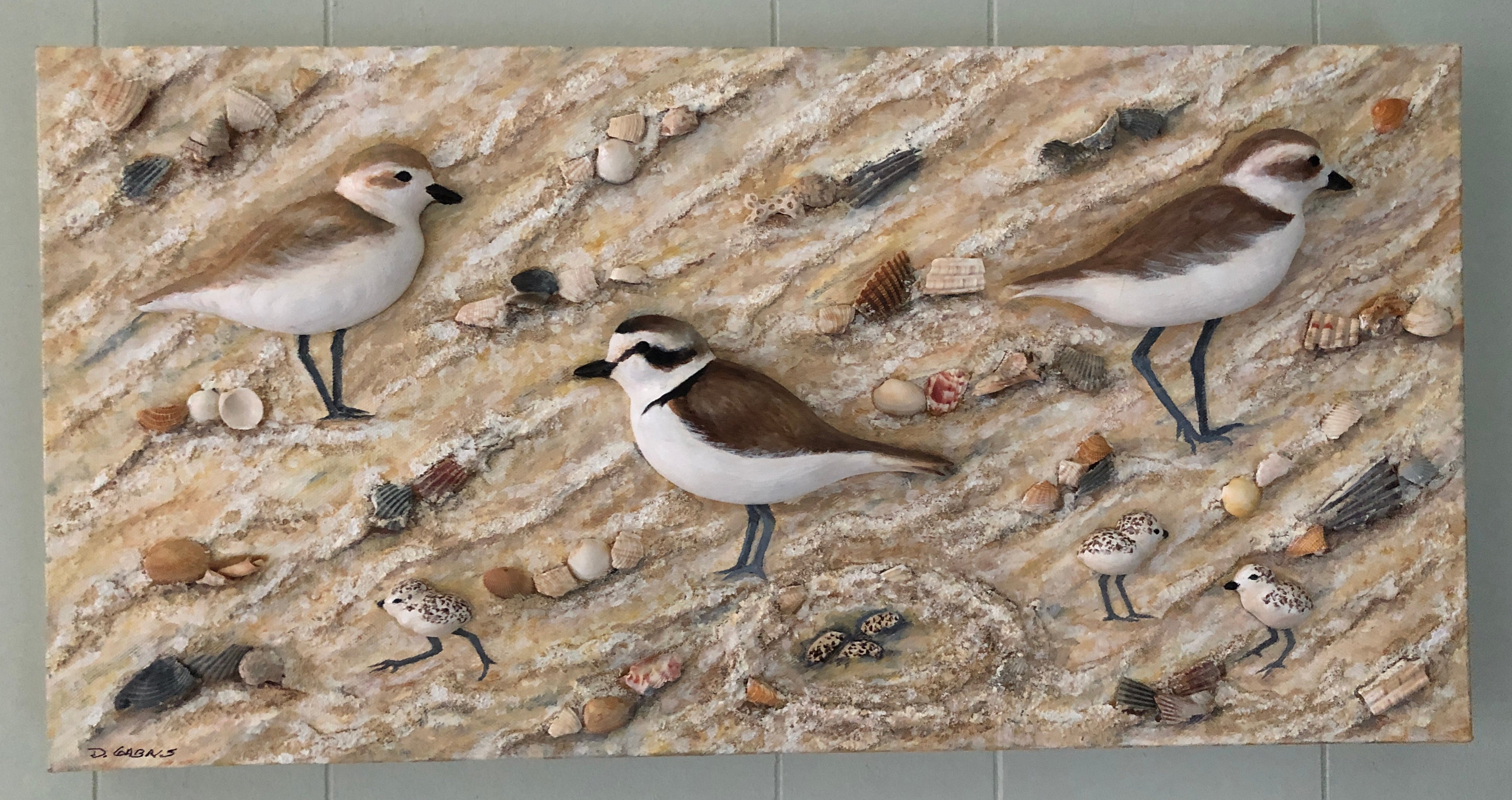 Raised Snowy Plover figures on canvas. Artwork by Deborah Gabris