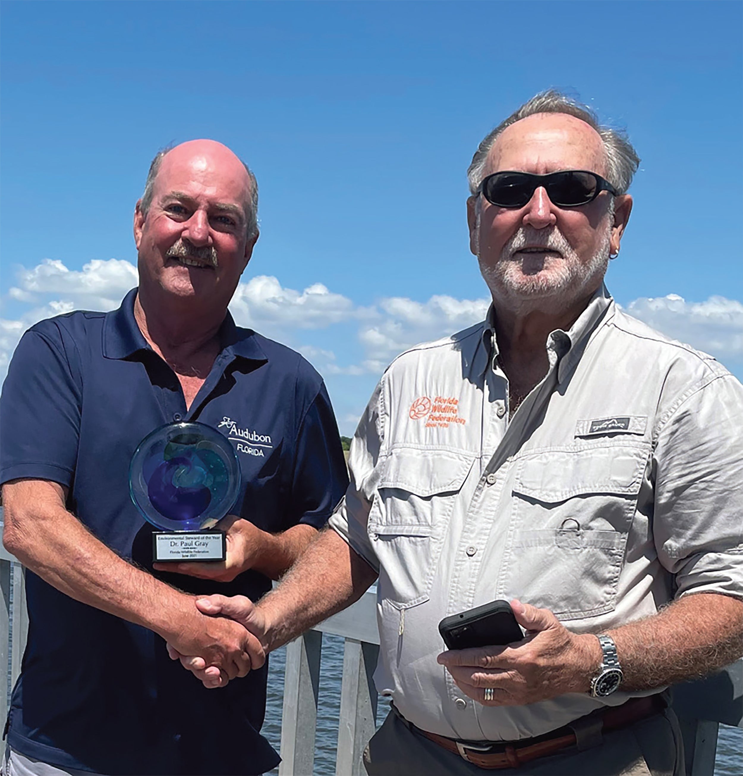 Paul Gray with award