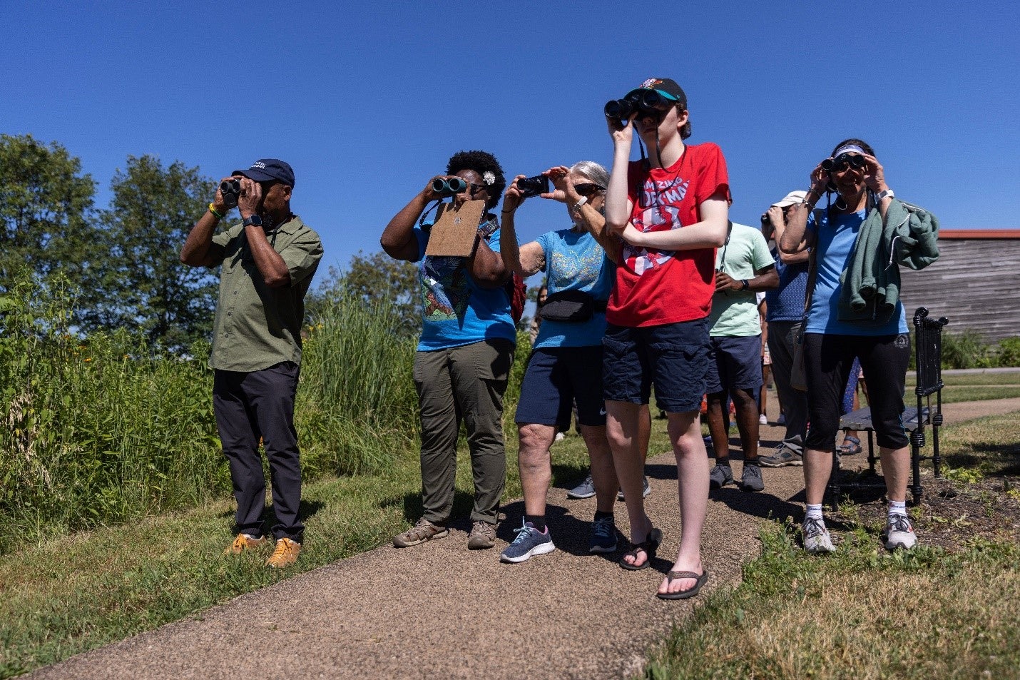 Dudley Edmondson and Nicole Jackson guiding community members on the bird walk. 