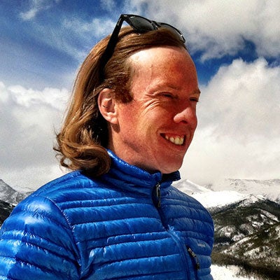 Aaron Maier smiling outside.