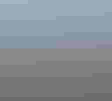 A partial rainbow over sagebrush steppe landscape.