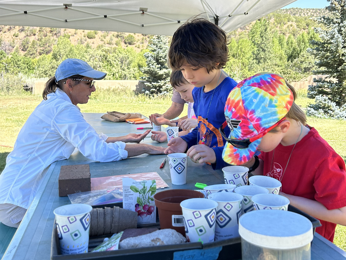 Santa Fe Master Gardeners volunteer to lead activities that help campers learn about plants and wildlife. 