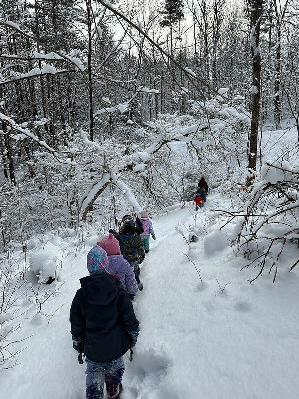 snowy hike with students