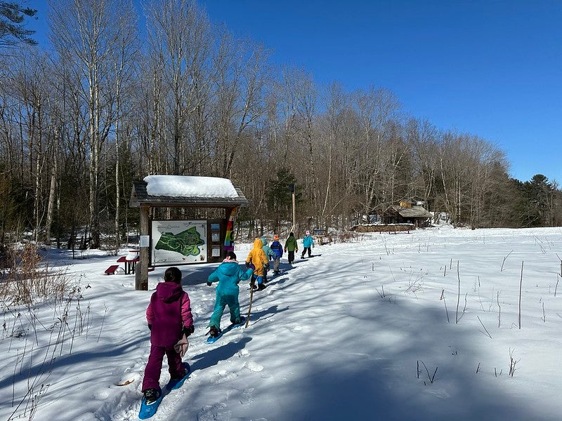 Students using snowshoes