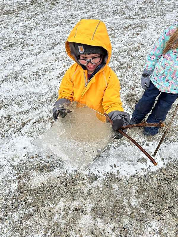 student holding ice