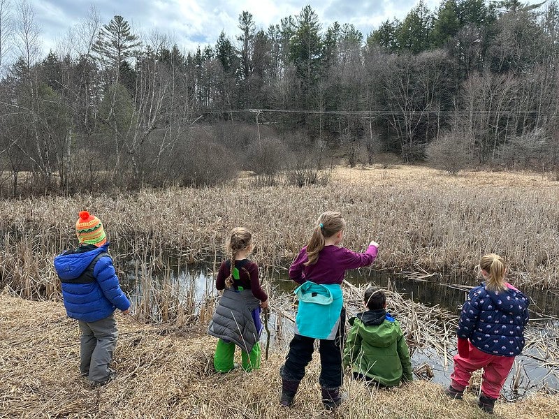 students at peeper pond