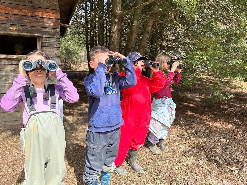 Students with binoculars