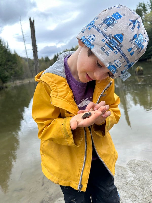 student holding turtle
