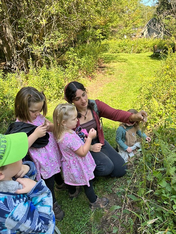 students looking at flowers