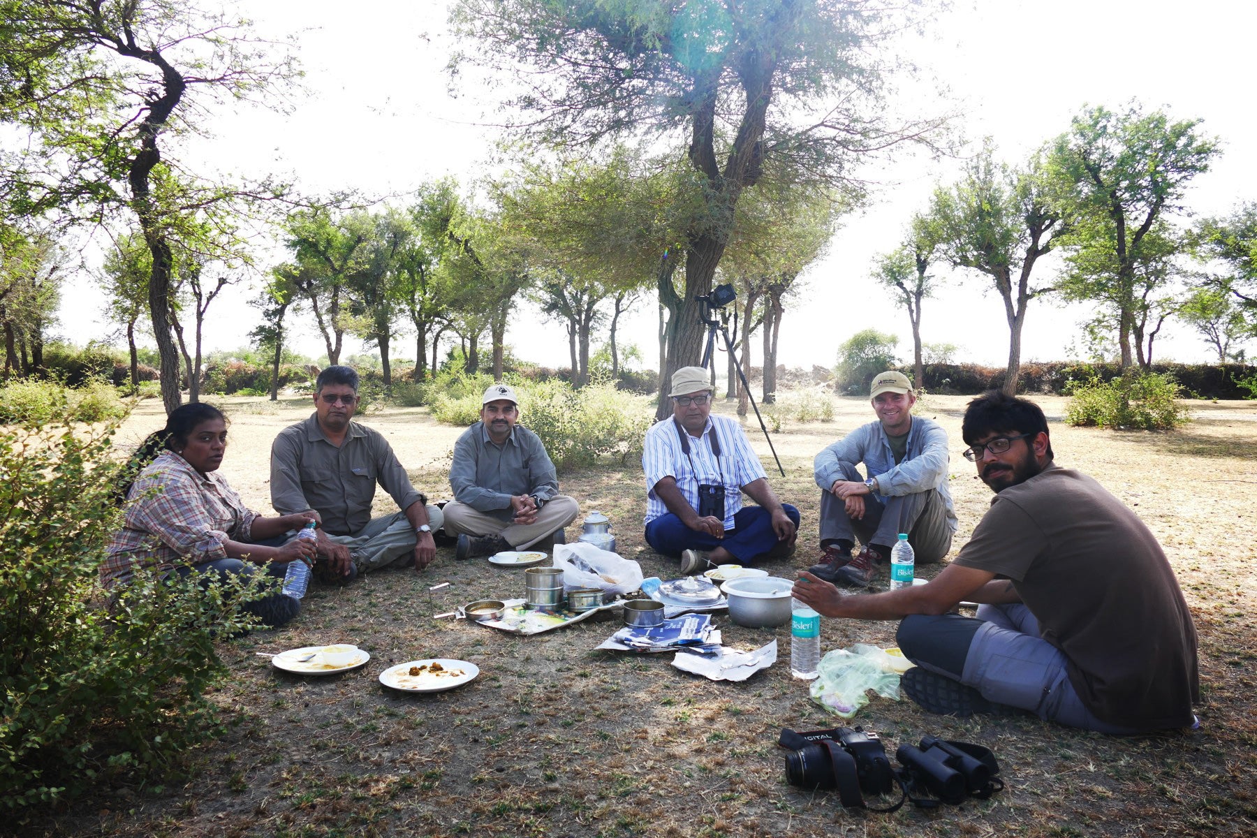 Padmini, Badri, Dhanajai, Poonia, Noah, and Ramit take an afternoon picnic. Noah Strycker