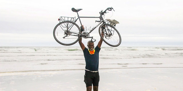 bicycle at beach artist scott 90s US Ski Team Sawtooth All Terrain Bike, Teal, 47cm/Small day comfort in the saddle Man Riding Bike With Surfboard