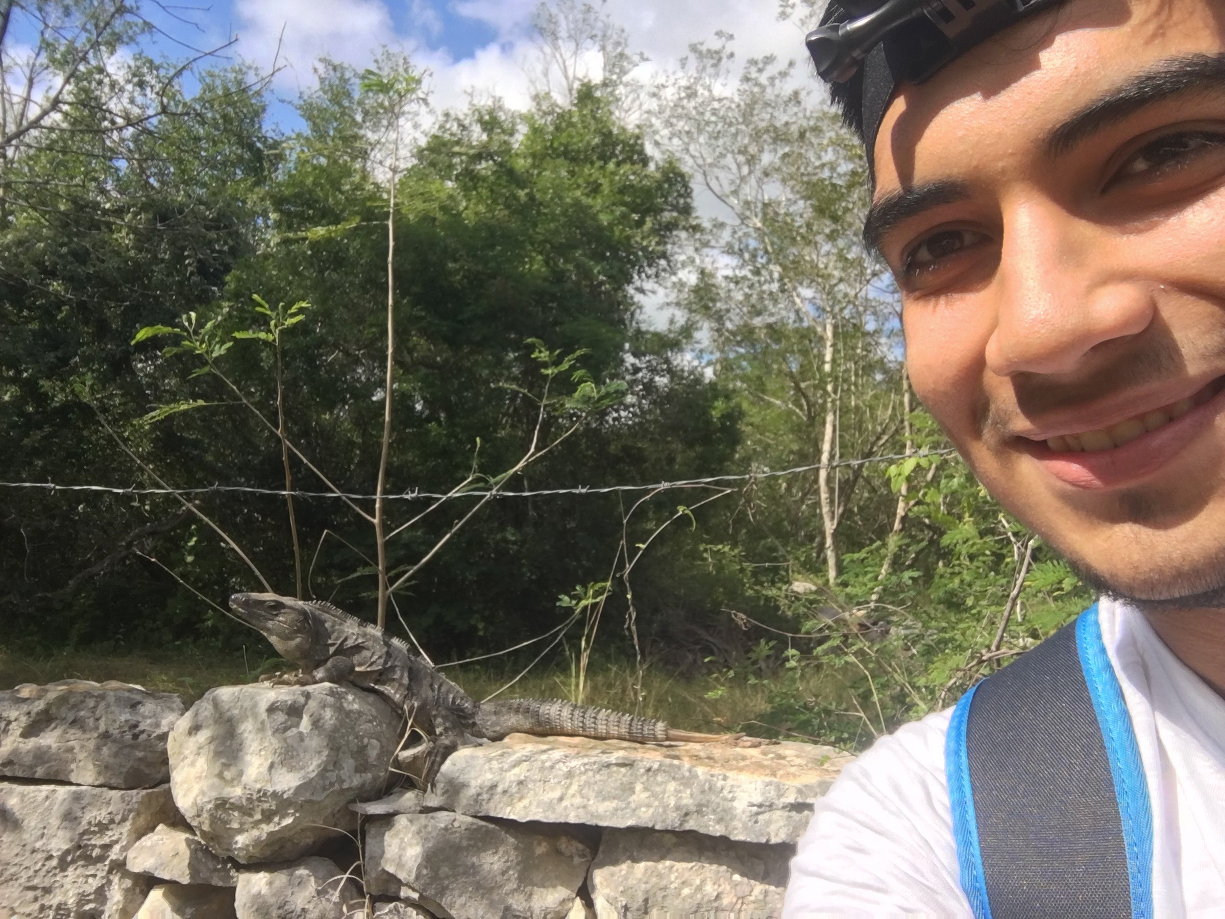 Ponce poses with an iguana during a trip to the state of Yucatán, Mexico, in 2019. Courtesy of Alonso Ponce