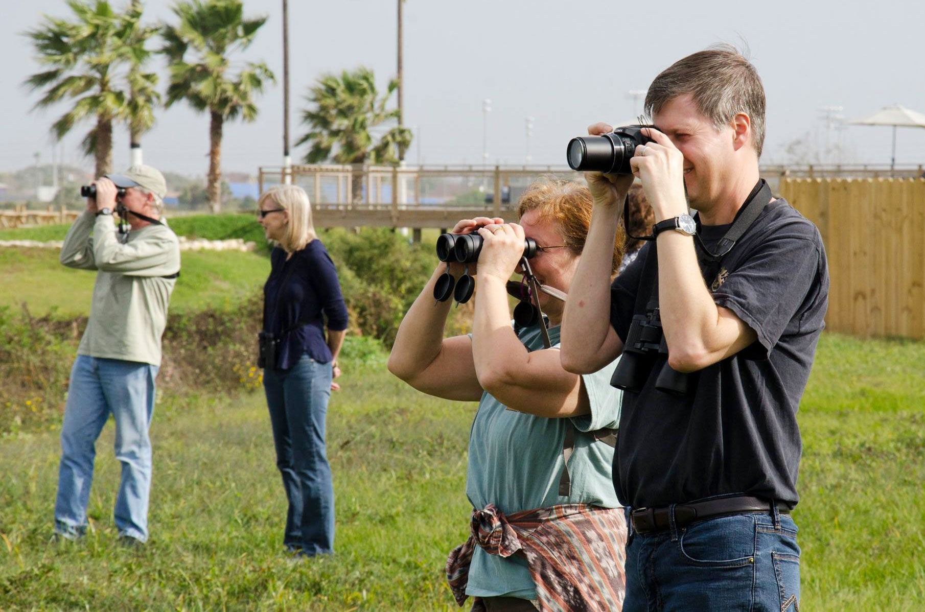 In Texas, you don't need a scarf—only binoculars—to enjoy wintertime birding. Courtesy of Galveston Island Nature Tourism Council